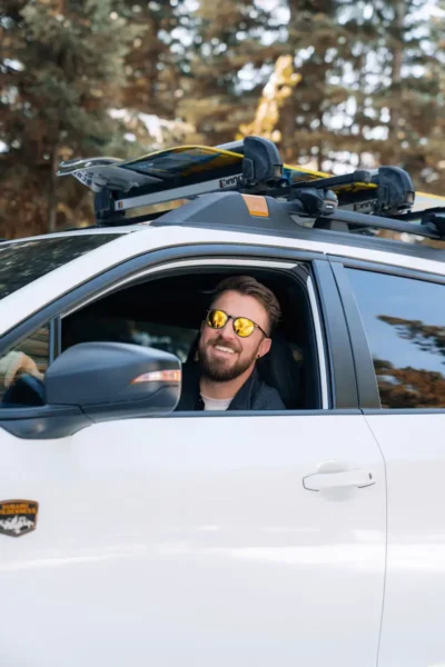 Man Reversing a caravan using side mirror